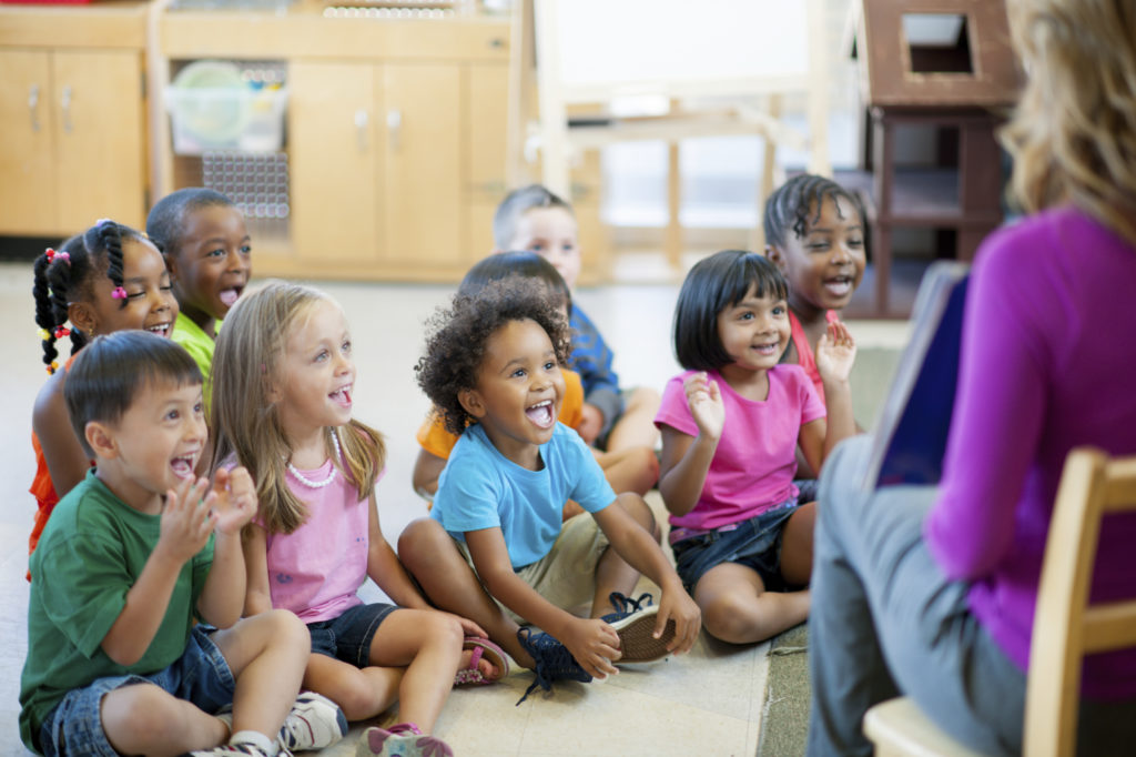 Multi ethnic group of pre-school children in a classroom.